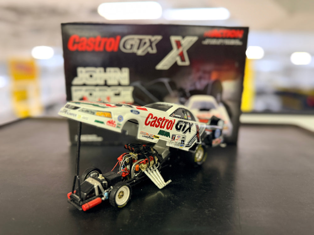 John Force Castrol GTX Funny Car diecast with body lifted showing chassis detail